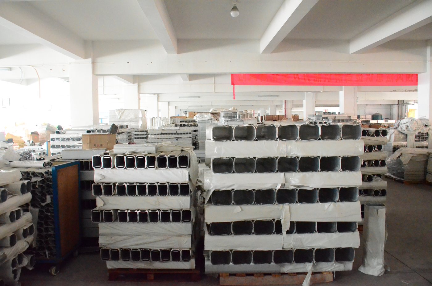 Finished e-bike battery cases racked and ready for dispatch at the Guangzhou factory